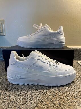 Nike All-White Platform Air Force Low Top Sneakers